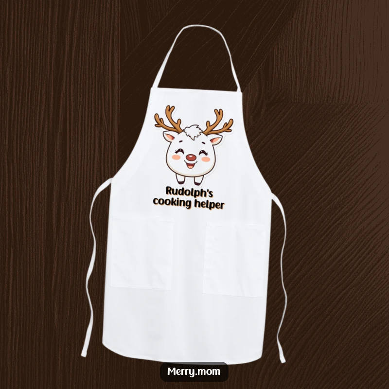 Funny apron with a creature wearing reindeer antlers and a broad smile, perfect for holiday cooking.