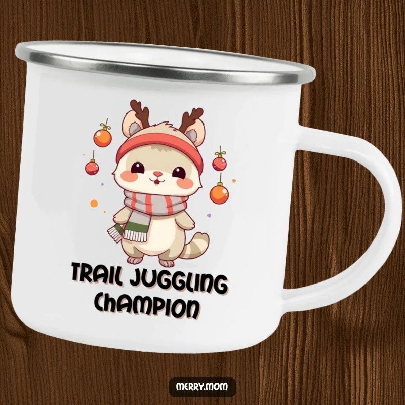 Funny camping mug showing a creature in a scarf juggling tiny ornaments, ideal for festive outdoor trips.