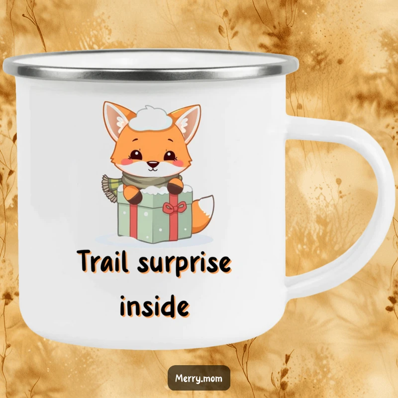 Funny camping mug depicting a playful fox with a scarf peeking from behind a snowy gift, perfect for outdoor winter fun.