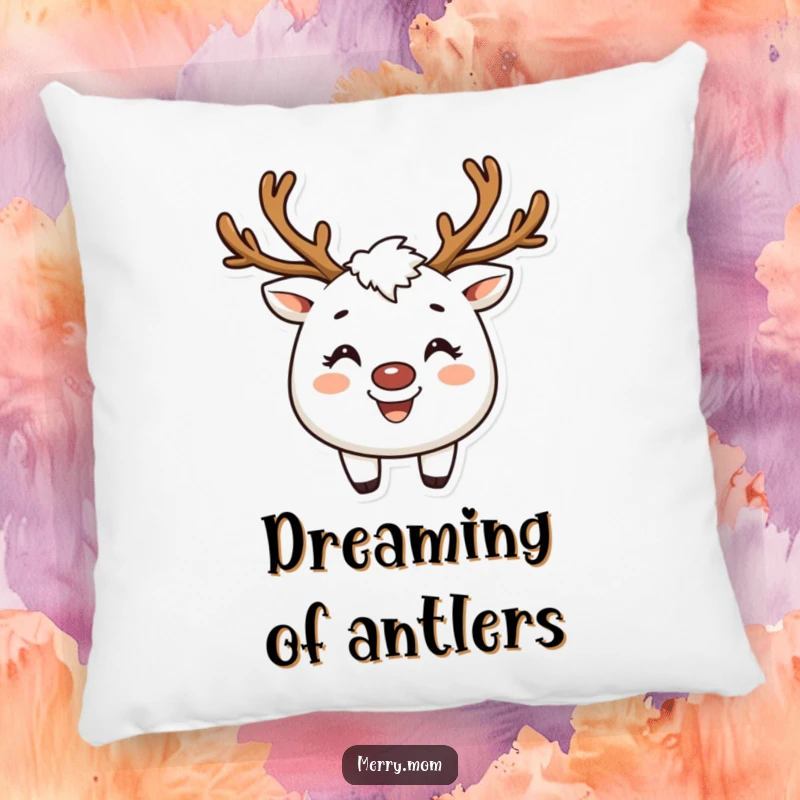 Funny pillow featuring a creature with reindeer antlers and a broad smile, adding festive charm.