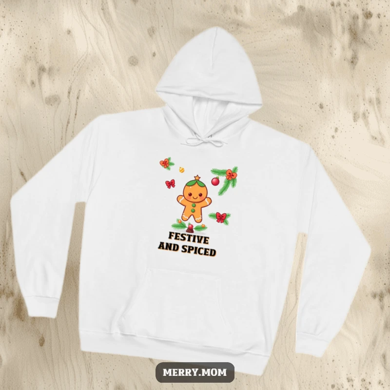 Funny hoodie showcasing a cheerful gingerbread man character decorating a festive Christmas tree, perfect for cozy holiday moments.