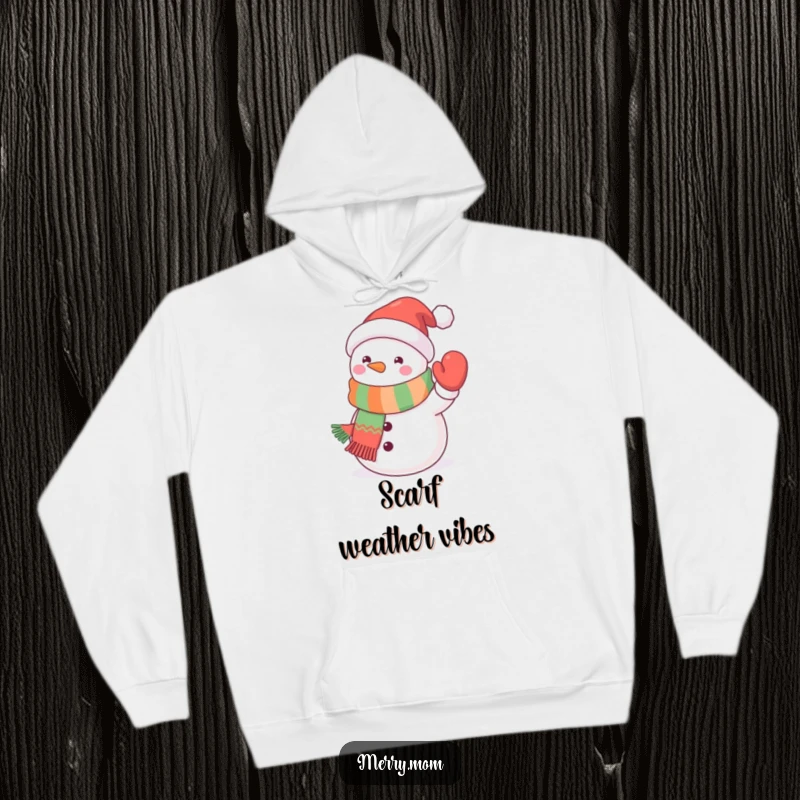 Funny kawaii snowman hoodie featuring a cute snowman wearing a festive scarf and waving a mitten, offering warmth and winter charm.