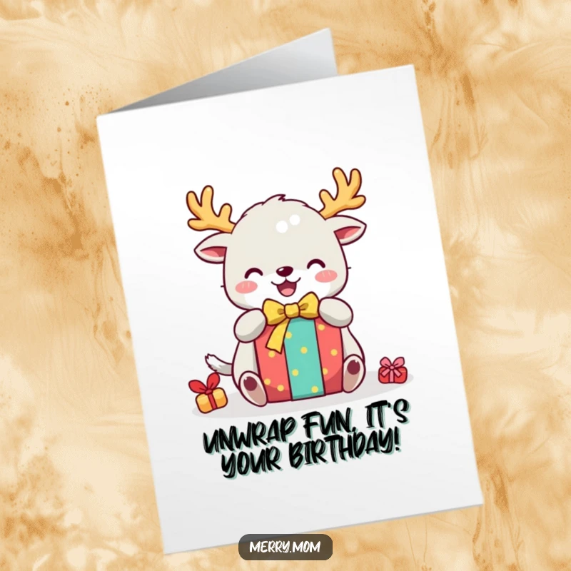Funny free printable birthday card: a cute creature with festive antlers happily unwraps a brightly colored gift box.