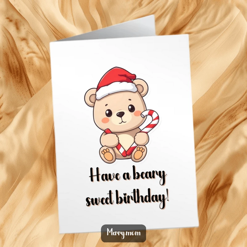 Free Printable Santa Bear Birthday Card: A sweet bear in a Santa hat holding a candy cane, wishing a happy birthday.