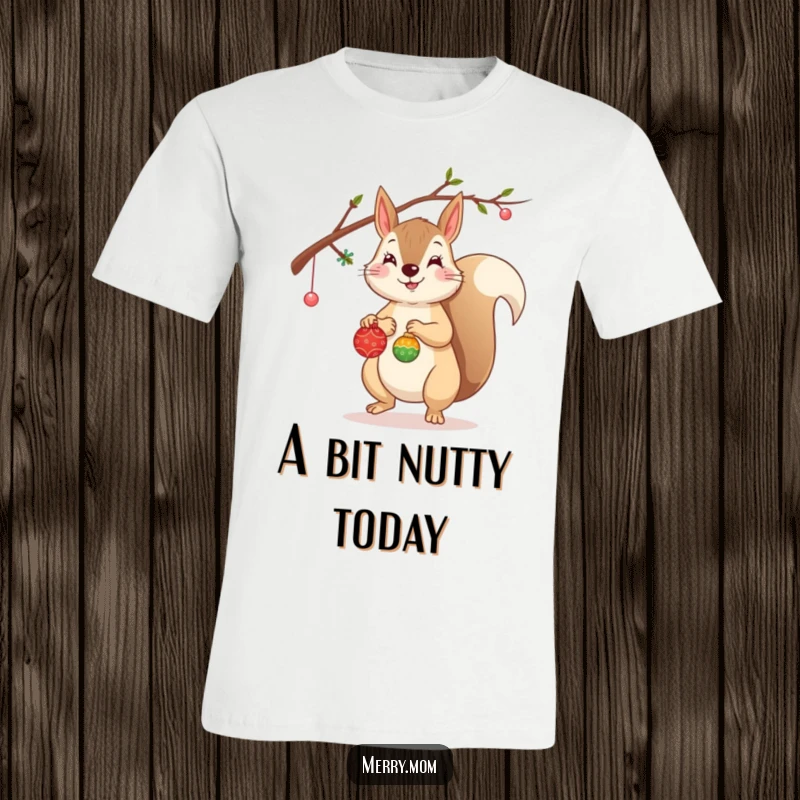 Funny Squirrel T-Shirt featuring a cheerful squirrel decorating a branch with tiny ornaments, full of holiday zest.