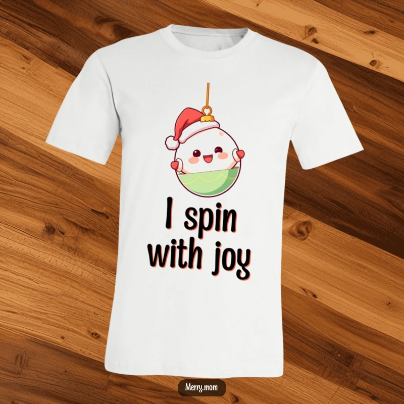 Funny t-shirt featuring a cute Kawaii Christmas ornament character happily spinning, embodying festive cheer.
