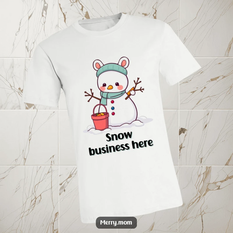Funny T-Shirt: A cute animal diligently building a snowman with a bucket and carrot, embodying winter joy.